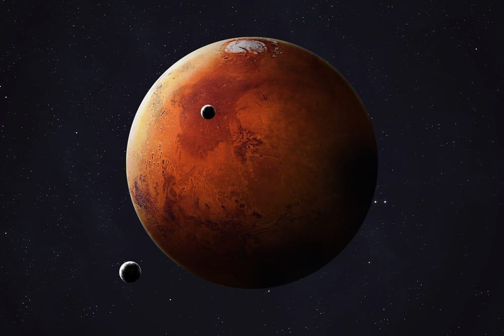 Mars and its moons collage photo of Mars through Hubble telescope camera captures