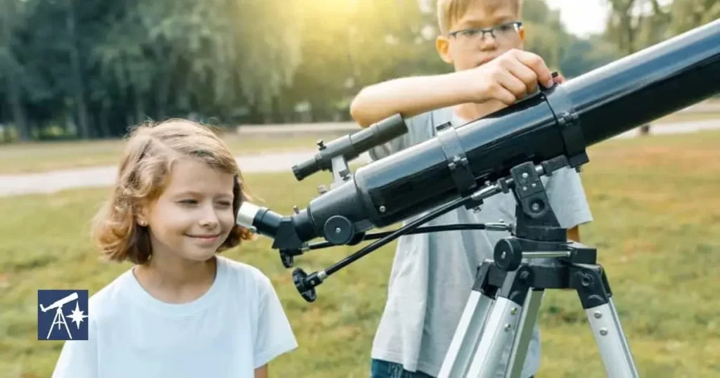 telescopes for children help them learn about the world around them. Two children having fun with telescope